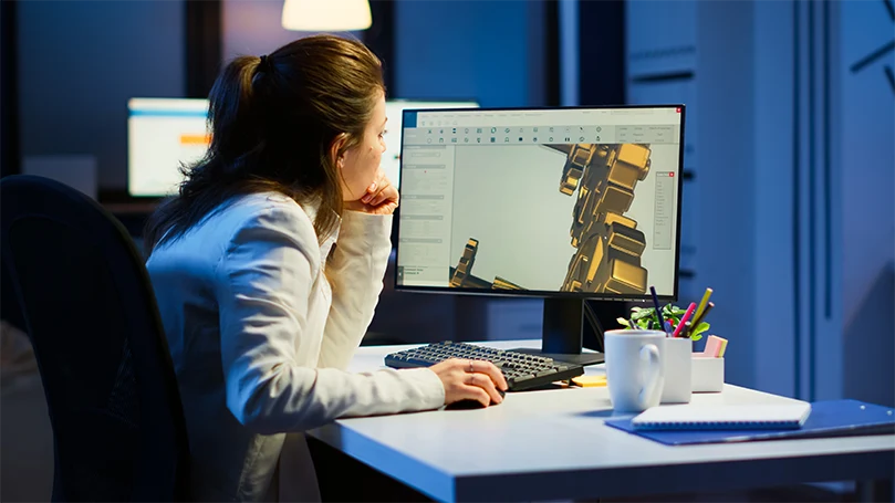 een beeld van een vrouw die op een pc werkt voordat ze gaat slapen