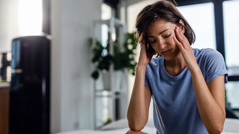 Een afbeelding van een vrouw met een paniekaanval